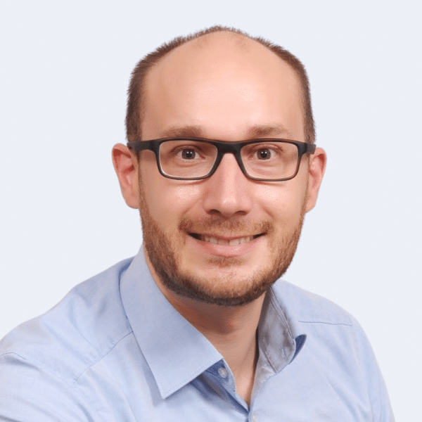Portrait of Christoph Schuler, Director of Sales and Business Transformation at Sagacity